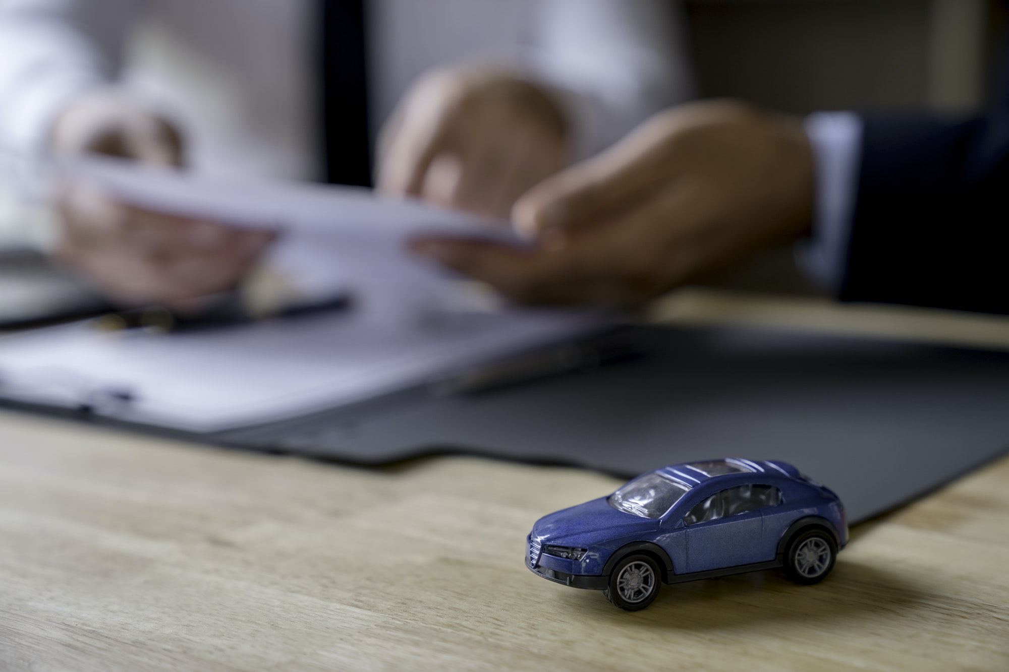 Insurance brokers are negotiating car insurance with customers, insurance, contracts.